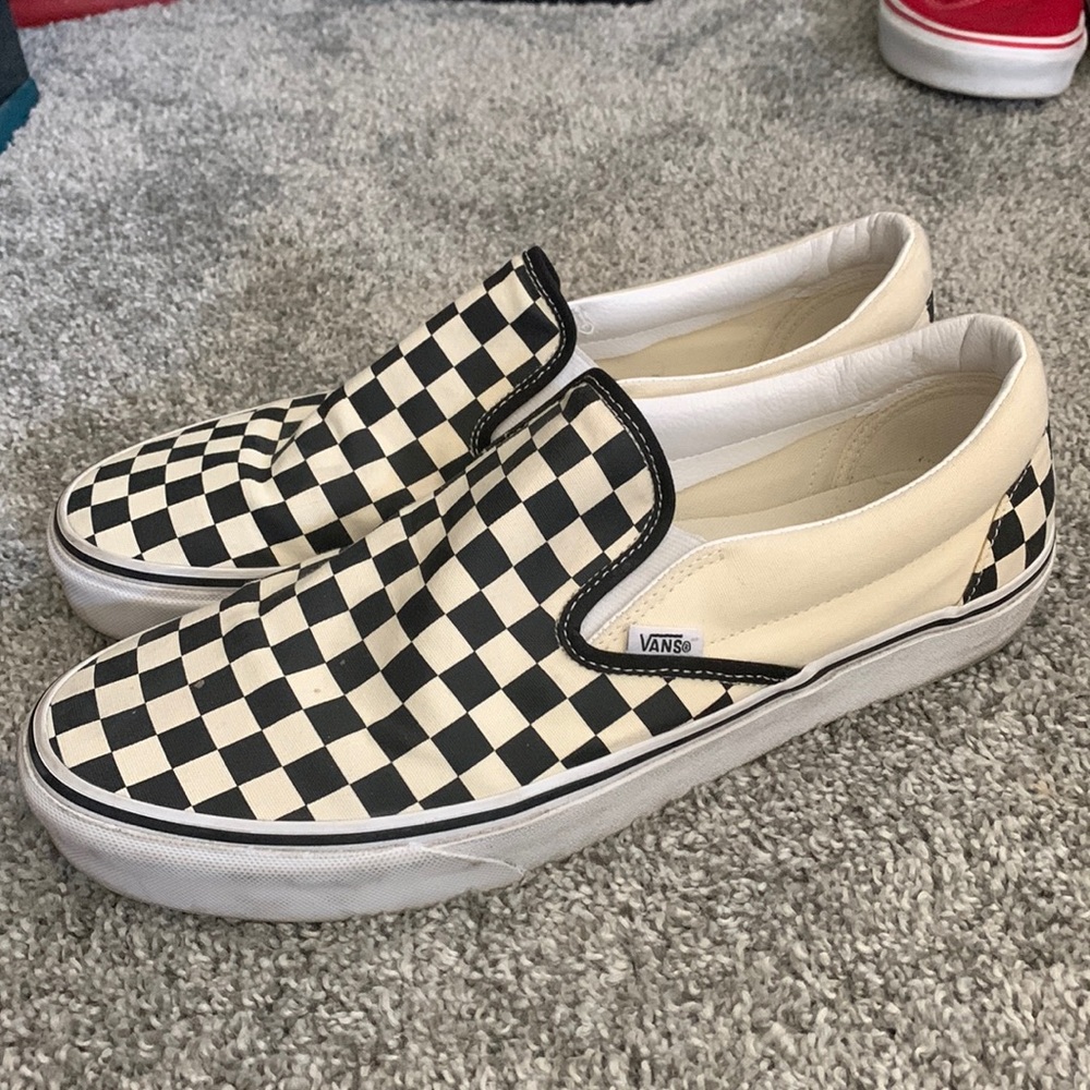 Black and white slip on checkered Vans. Size 12